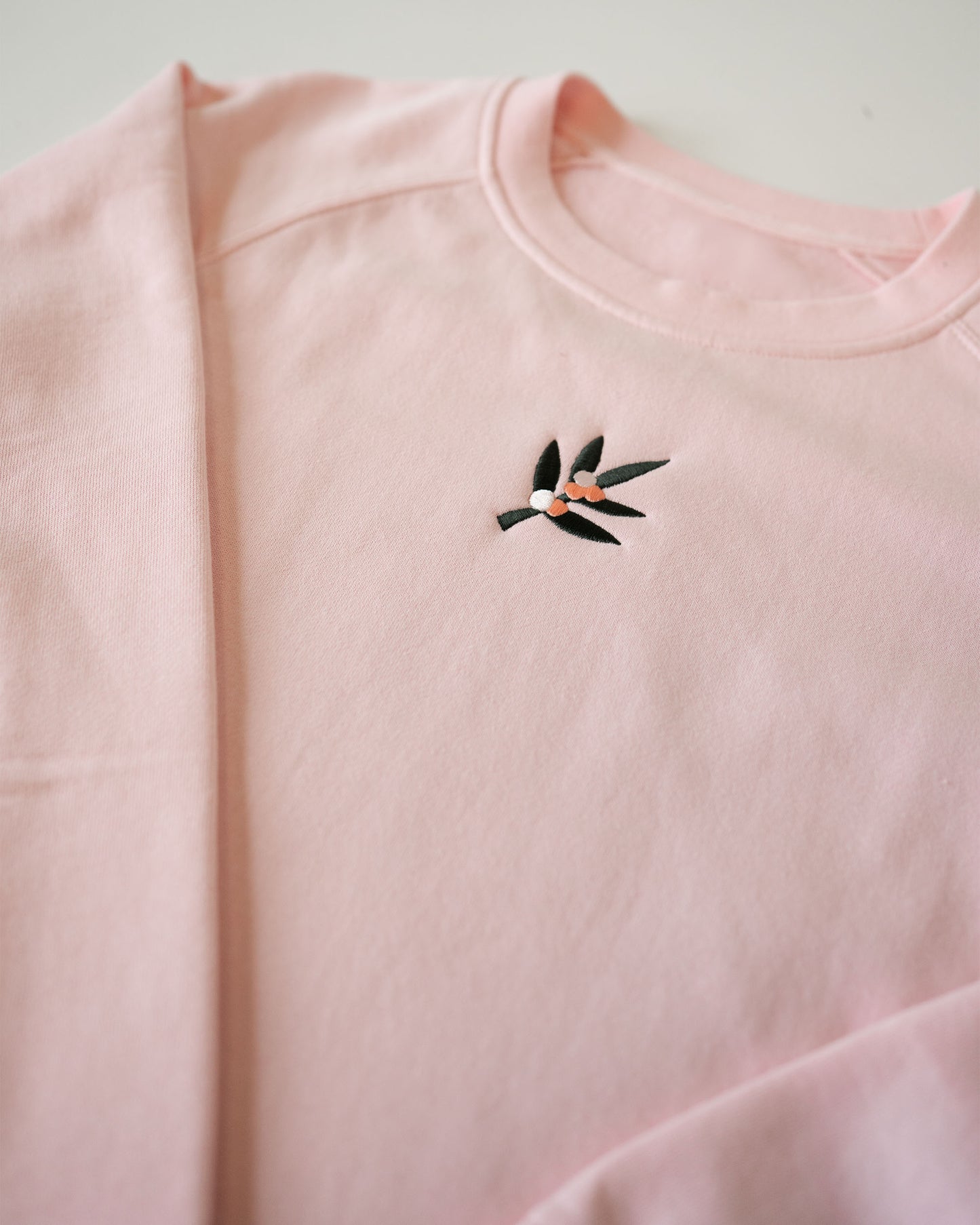BIENVENUE EMBROIDERED PULLOVER